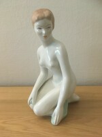 Aquincum kneeling female nude porcelain