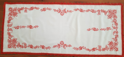 Embroidered runner with floral pattern