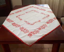 Embroidered tablecloth with floral pattern