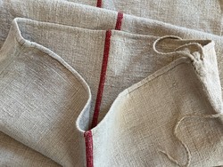 Old large home-woven canvas bag with a red stripe
