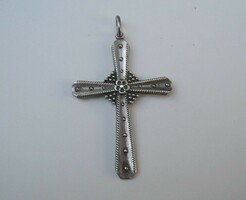 Silver cross pendant with flower decoration