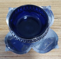 Flower-shaped metal base and blue glass bowl