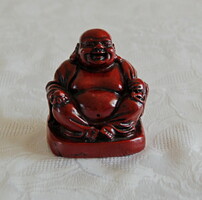 Budha szobor vörös rezinből