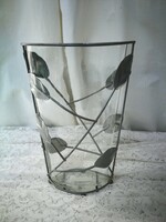 Glass vase with metal decoration