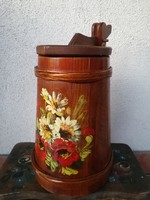 A wooden cup decorated with a folk motif, 35 cm high including the handle, 20 cm in diameter at the bottom.