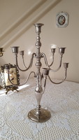 Silver-colored, nine- or five-branched candlestick