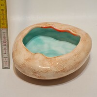 Brown, blue-glazed ceramic ashtray marked 
