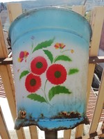 Enamel flower bucket is good for flowers with a hole in the bottom