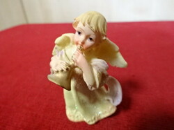 Flute-playing angel, in gilded clothes, height 6 cm. Jokai.