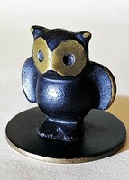 Old tiny bronze owl