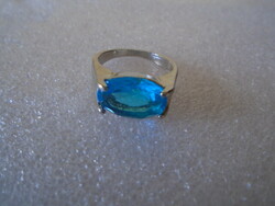 Rhodium-plated anti-allergenic women's ring with synthetic sapphire stone, inner size 17.5 mm, new, unused. Po