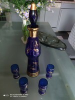 Blue glass decanter with polished stopper