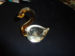 It can be a transparent glass swan, an ashtray, or even a sugar bowl