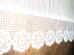 A pair of beautiful vintage-style stained glass curtains with a lace bottom