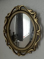 Oval mirror in a very beautiful openwork carved wooden frame,