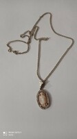 Old silver-colored filigree necklace with cameo pendant, women's jewelry