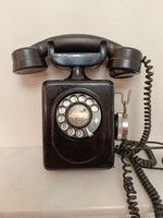 Antique wall rotary phone device from the 1930s vintage phone 265 7952