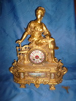 Antique half-baked metal mantel clock with decorative porcelain dial