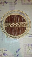 Wicker serving basket with a cross stitch pattern