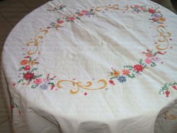 Beautiful tablecloth embroidered on antique vintage linen
