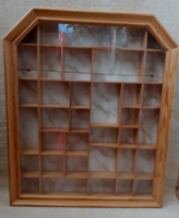 Wooden wall-mounted small cabinet with opening doors in good condition for showcase collections