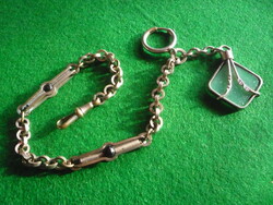 Art deco metal watch chain.