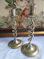 Pair of old metal candle holders. Their height is 18 cm.