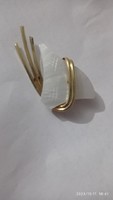 Old brooch, elegant, white mother-of-pearl ornate gold-plated jewelry, antique shell pin