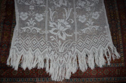 Large lace inset, fringed curtain