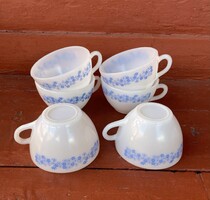 Milk glass tea cup cup with blue pattern