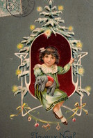 Antik dombornyomott Karácsonyi üdvözlő képeslap - kislány játék elefánttal, ,karácsonyfa