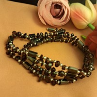 String of magnetite and garnet beads, 90 cm