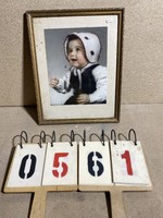 Photo of a baby, old, in a frame, 23 x 30 cm.