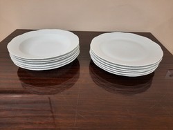 12 deep, flat plates of white Herend porcelain
