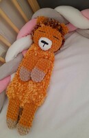 Hand crocheted sleeping plush lion.