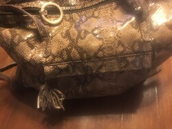 Almost completely new, barely used, beautiful handbag with snakeskin pattern, reticule. Size: 45cmx38cm