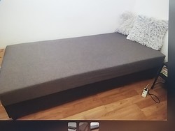 Single bed/couch with linen rack