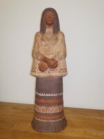 Ceramic figure with ms mark