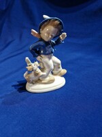 German blue-painted porcelain with a hat, scarf, boy and puppy