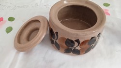 Small container with a brown pattern