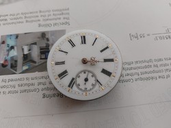 (K) remains of pocket watch, pendulum broken