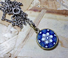 Millefiori glass pendant in a copper frame on a silver chain
