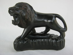 Carved wooden lion 15x17 cm