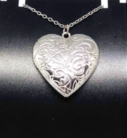 Stainless steel necklace with a carved heart-shaped picture pendant 48