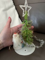 Old mini pine Christmas tree with Santa Claus Christmas tree decoration