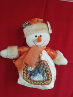 Christmas snowman figurine in sugar bowl