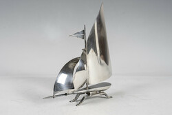 Silver sailing ship model