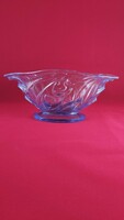 Glass serving dish, center of the table in a bluish shade