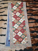 Tapestry woven tablecloth. 154 cm x 31 cm.