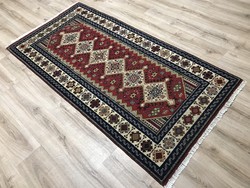 Old hand-knotted wool Persian rug from Békésszentandra, 102 x 205 cm
